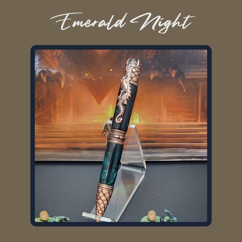 - Emerald Night
Copper dragon pen with deep green resin barrel—handmade fantasy pen inspired by forest lore and night magic.